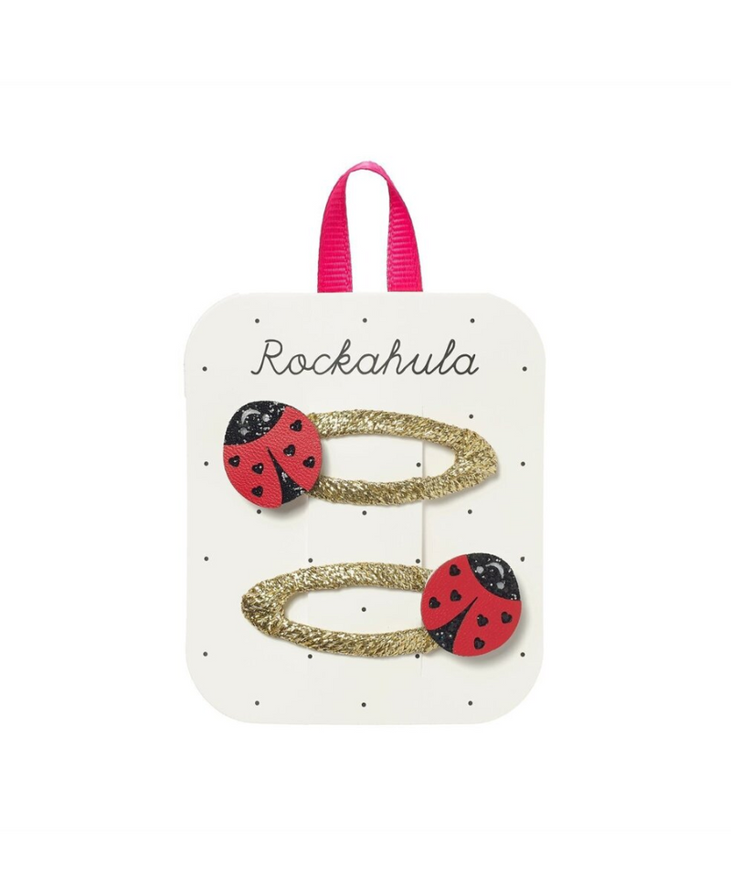 סיכות לשיער לילדות בעיצוב פרת משה רבנו אדומה מנצנצת על סרט זהב