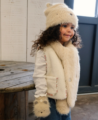 girl wearing oft teddy bear cozy winter accessories for kids 